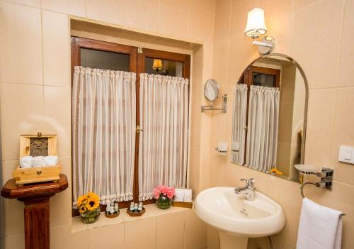 Koupelna v ubytování Hotel + Arte