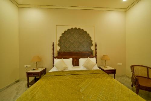 Postel nebo postele na pokoji v ubytování Dera Jaipur Homestay
