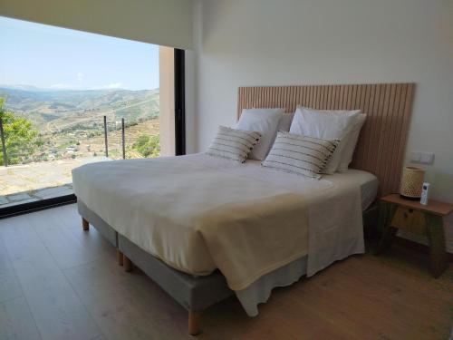 Katil atau katil-katil dalam bilik di Quinta da Lua Villa Douro Valley