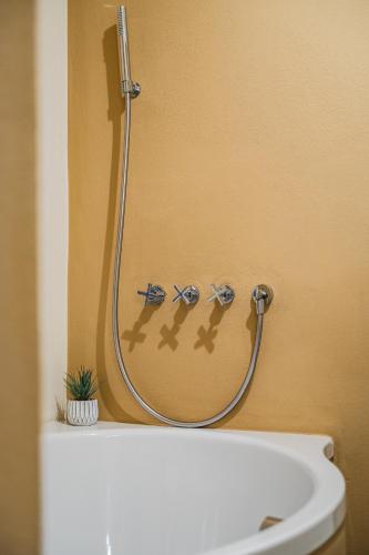 a shower in a bathroom with a sink at Casa delle Note in Modena