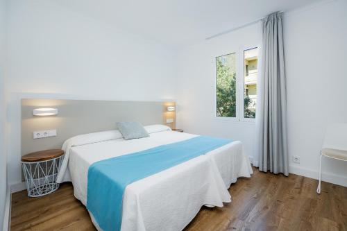 Postel nebo postele na pokoji v ubytování Apartament Massanet 1a