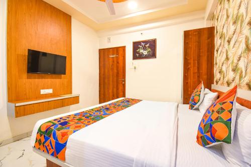 FabHotel Prime Kharadi Residency - Nr - World Trade Center Puneにあるベッド
