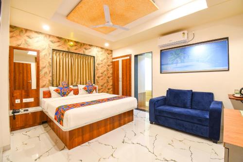 FabHotel Prime Kharadi Residency - Nr - World Trade Center Puneにあるベッド