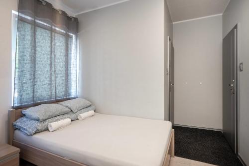Postel nebo postele na pokoji v ubytování Keja Aparts - 02 Gdynia Centrum