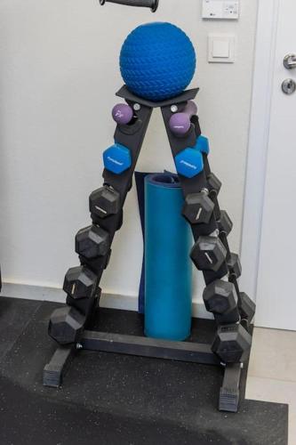 a skeleton standing next to a blue cup at Ocean View 1111 Retreat in Rikia