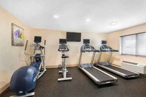 a gym with treadmills and cardio equipment in a room at Best Western Rochester Marketplace Inn in Rochester