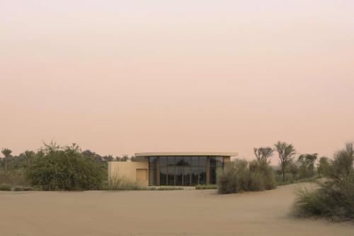 a building in the middle of a desert at Bab Al Shams, A Rare Finds Desert Resort, Dubai in Dubai