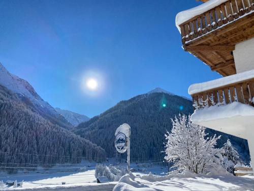 a balcony of a house with snow on the ground at Haus Arlberg in Pettneu am Arlberg