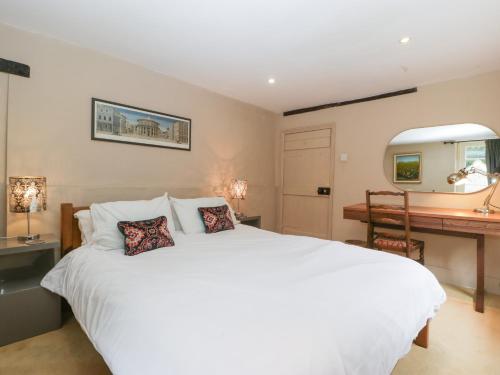Ένα ή περισσότερα κρεβάτια σε δωμάτιο στο Danby Lodge