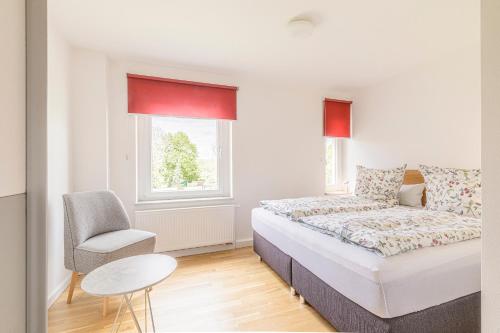 Postel nebo postele na pokoji v ubytování Apartment Premium family im Gustav Seitz Gästehaus