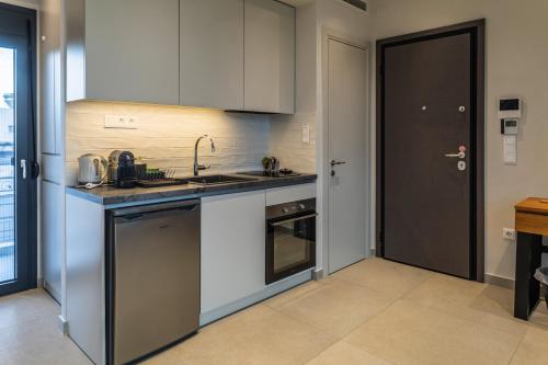 Dapur atau dapur kecil di Toumba apartments