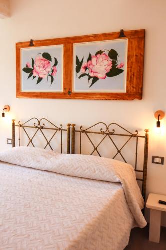 Una cama o camas en una habitación de Podere FicOlivo