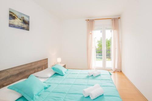 Postel nebo postele na pokoji v ubytování Family house with 2 apartments - Irma