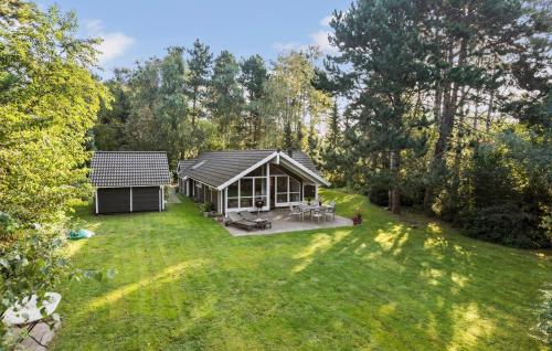 an overhead view of a house in a yard at 4 Bedroom Beautiful Home In Melby in Melby