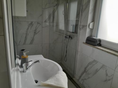Koupelna v ubytování Apartma Dea