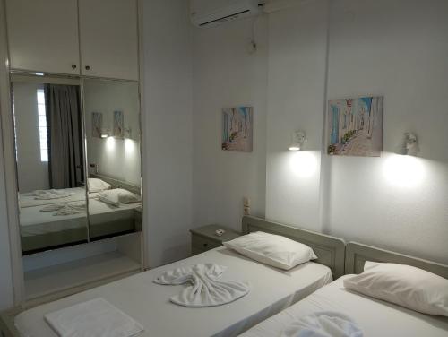 Posteľ alebo postele v izbe v ubytovaní Renia Studios - 4 adults