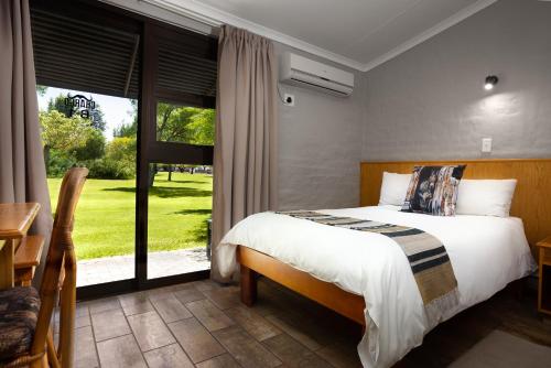 Katil atau katil-katil dalam bilik di Merino Inn Hotel