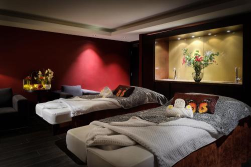 Letto o letti in una camera di Hilton London Syon Park