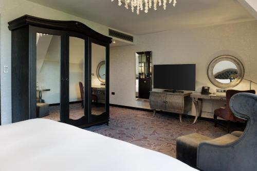 Letto o letti in una camera di Hilton London Syon Park