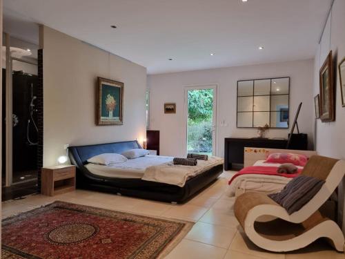 เตียงในห้องที่ Les Vignes de Pagès - Villa de Standing