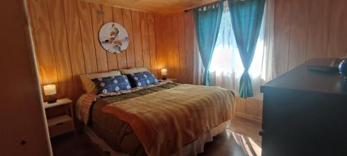 Postel nebo postele na pokoji v ubytování Cabaña Pinos del Mar