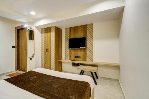 Μια τηλεόραση ή/και κέντρο ψυχαγωγίας στο Hotel Royal Ican Sindhubhavan Road