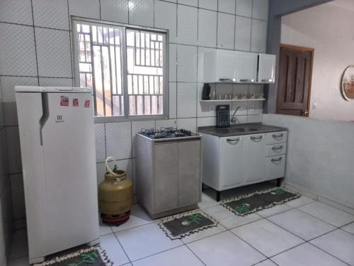 Kuchyň nebo kuchyňský kout v ubytování Conforto Alternativo