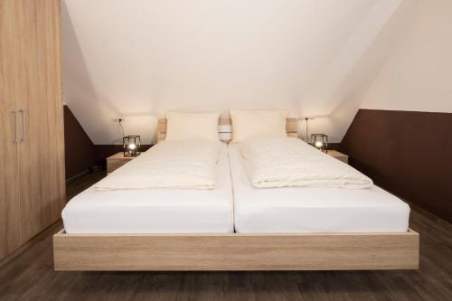 Katil atau katil-katil dalam bilik di Ferienwohnung Amboss