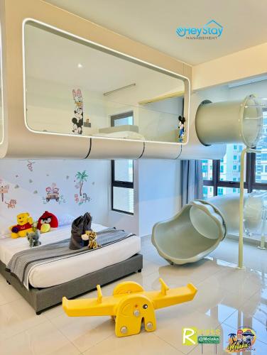 Katil atau katil-katil dalam bilik di Bali Residence Melaka By Heystay Management