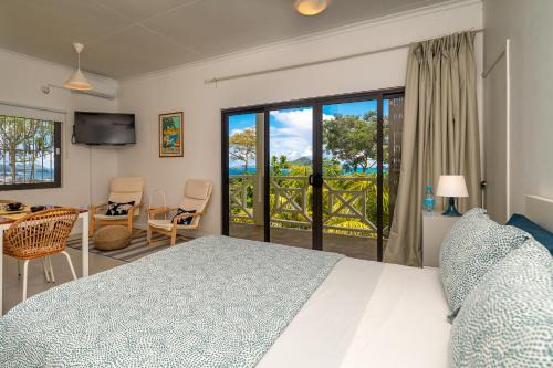 Postel nebo postele na pokoji v ubytování Naturalis - Oceanview Residences