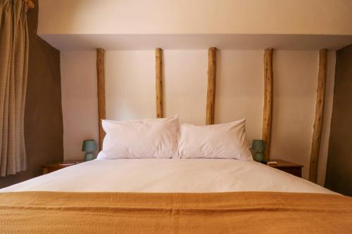 Katil atau katil-katil dalam bilik di Prestigious 3BR House in Valle Sagrado