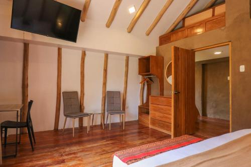 Televisyen dan/atau pusat hiburan di Prestigious 3BR House in Valle Sagrado