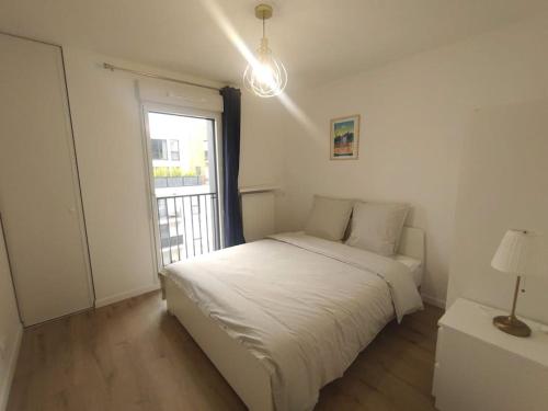 Ένα ή περισσότερα κρεβάτια σε δωμάτιο στο Gustave Roussy, New building, 3 bd & Salon, 2 WC