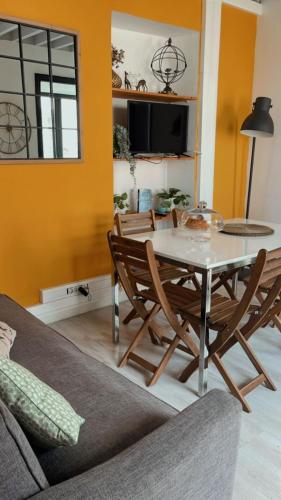 a dining room with a table and chairs at Fenais da Luz House in Fenais da Luz