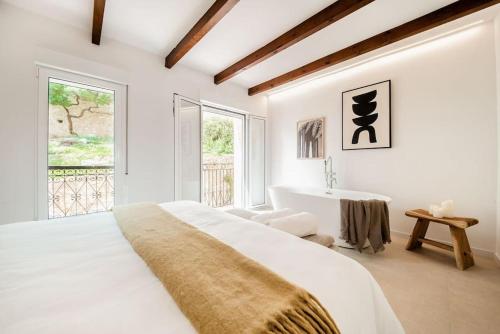 En eller flere senge i et værelse på Toques de Glamour en el Casco Historico,Wifi,A.C.