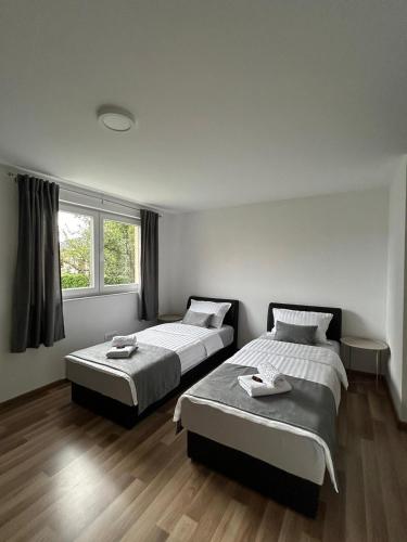 Postel nebo postele na pokoji v ubytování Apartman Iva