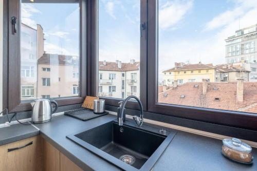 Η κουζίνα ή μικρή κουζίνα στο Budget Stay In City Center Near Ndk