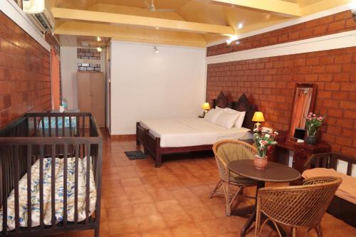 Letto o letti in una camera di Hillview Beach Resort