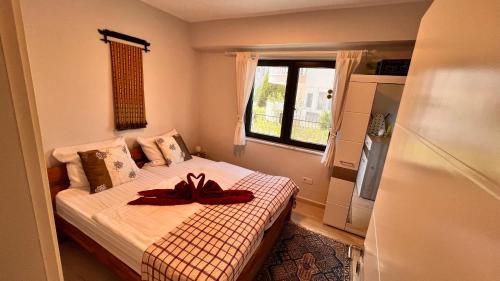 Ένα ή περισσότερα κρεβάτια σε δωμάτιο στο Exclusives Apartment Mountainview Residence