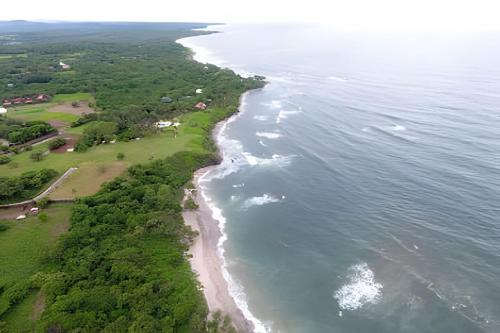 an aerial view of a beach and the ocean at Minutes away to the beach ¨Playa Blanca¨ in Paraíso