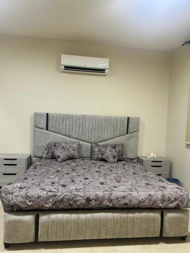 a bedroom with a large bed with a mattressvisor at فيلا سعد in Riyadh