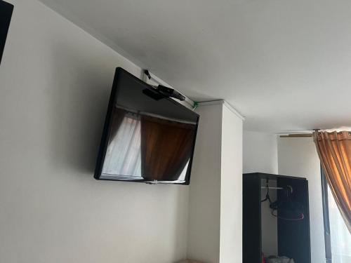TV a/nebo společenská místnost v ubytování hotel torre 52