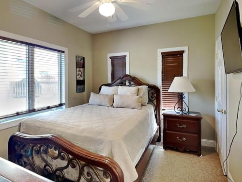 a bedroom with a large bed and a window at Lake House #9 in McHenry