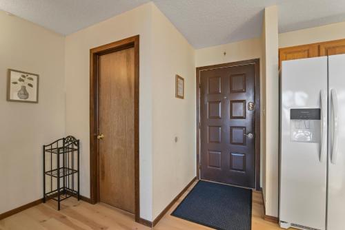 an empty room with a door and a rug at Pocono Mountain Village at Camelback 294 Overlook Way in Tannersville