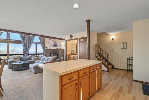 an open kitchen and living room with a couch at Pocono Mountain Village at Camelback 294 Overlook Way in Tannersville