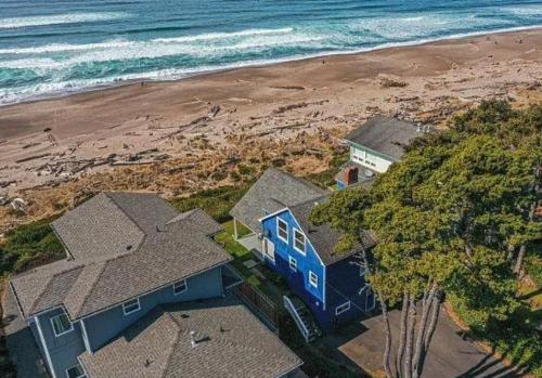 an aerial view of a house next to the beach at Coastal Serenity in Lincoln City