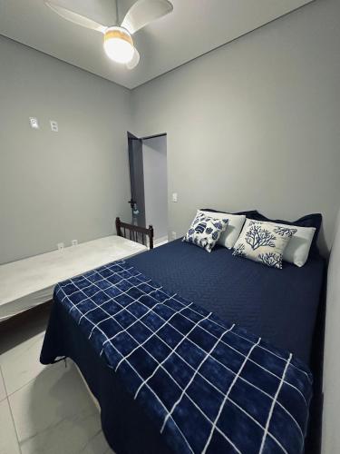 Ένα ή περισσότερα κρεβάτια σε δωμάτιο στο Apartamento Duplo