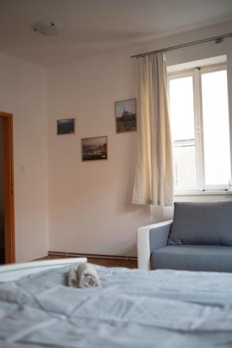 Postel nebo postele na pokoji v ubytování Apartmány Princ Děčín