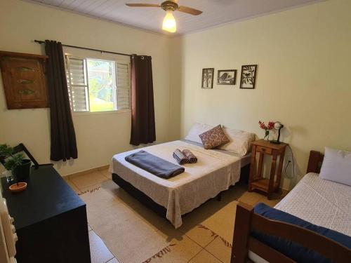 Katil atau katil-katil dalam bilik di Ecofazenda Lodge