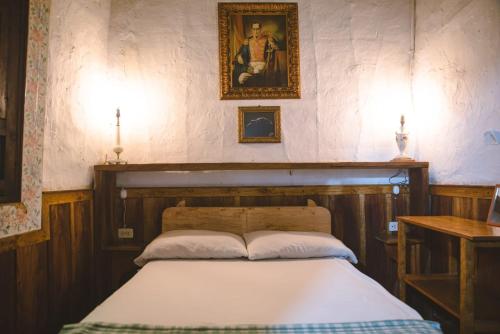Cama o camas de una habitación en Hostal La Casa De Lili